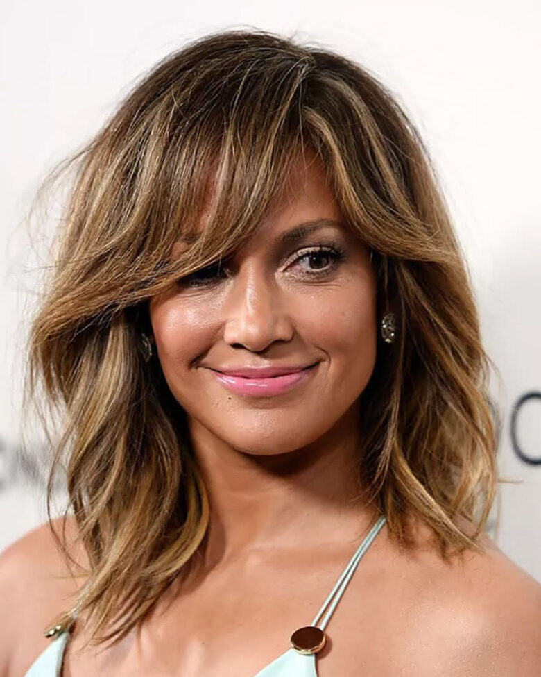 medium haircuts curtain bangs Luxe Digital