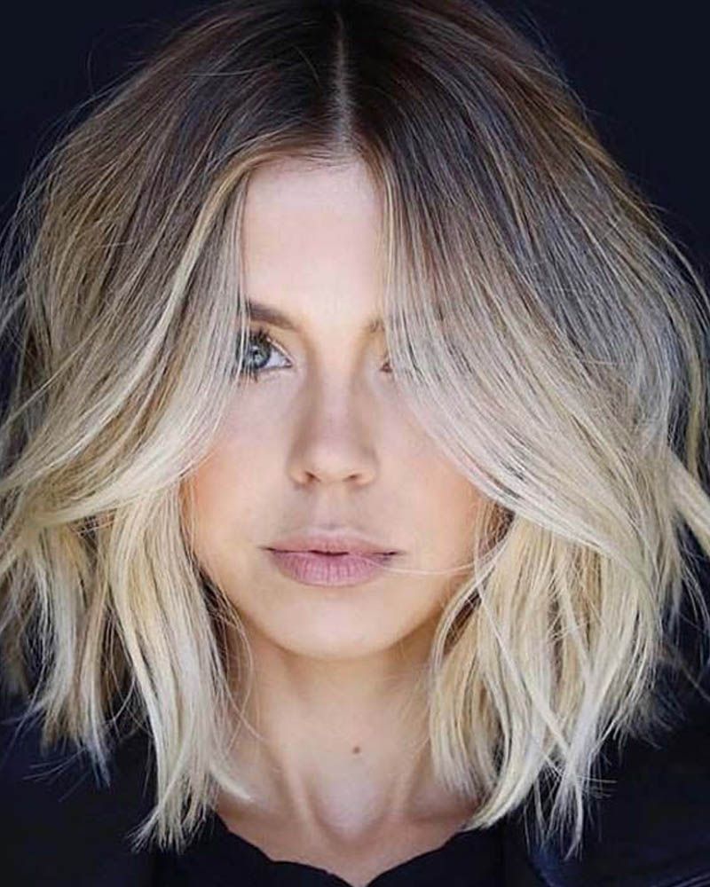 medium length hairstyles women blonde a line lob with face framing layers Luxe Digital