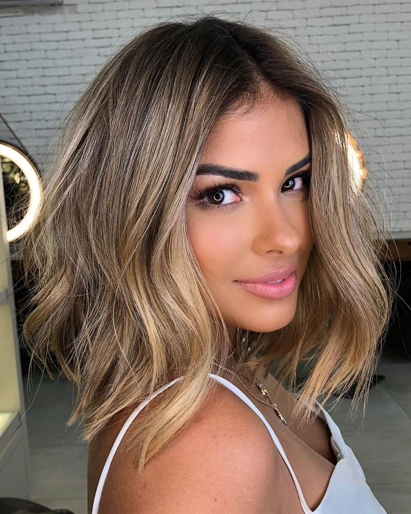 medium length hairstyles women long tousled lob with root fade Luxe Digital