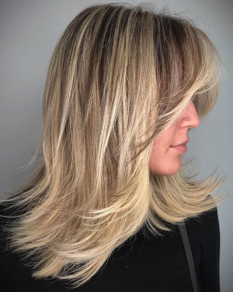 medium length hairstyles women medium hairstyle with backswept layers Luxe Digital