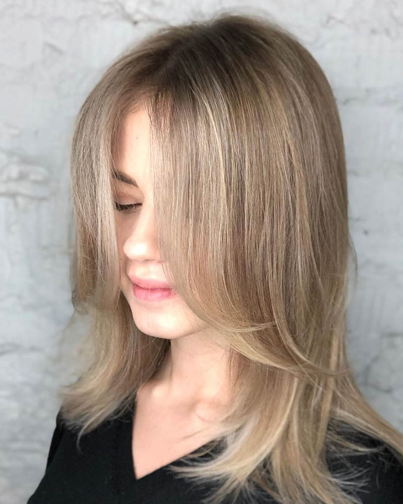 medium length hairstyles women medium hairstyle with swoopy layers Luxe Digital