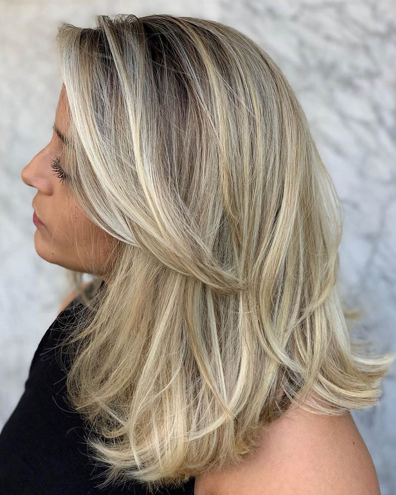medium length hairstyles women medium hairstyle with swoopy layers Luxe Digital