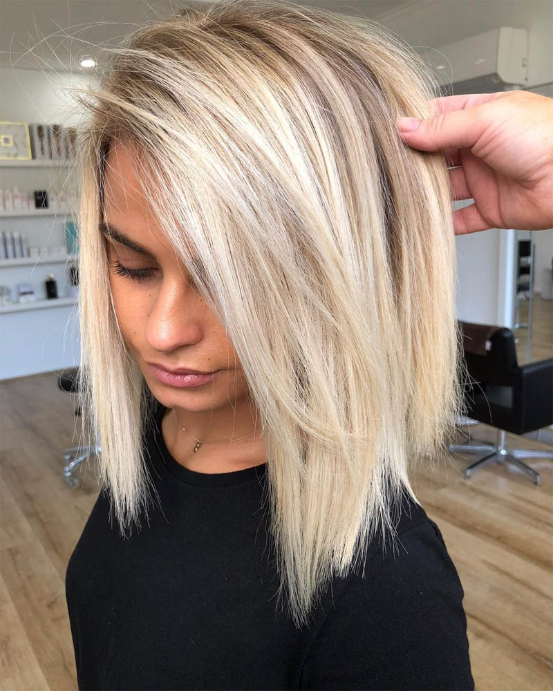 medium length hairstyles women mid length razored cut hairstyle Luxe Digital
