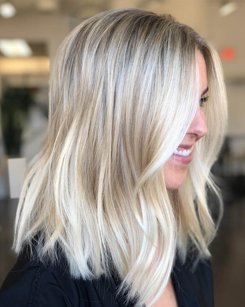 medium length hairstyles women straight blonde bob blowout Luxe Digital