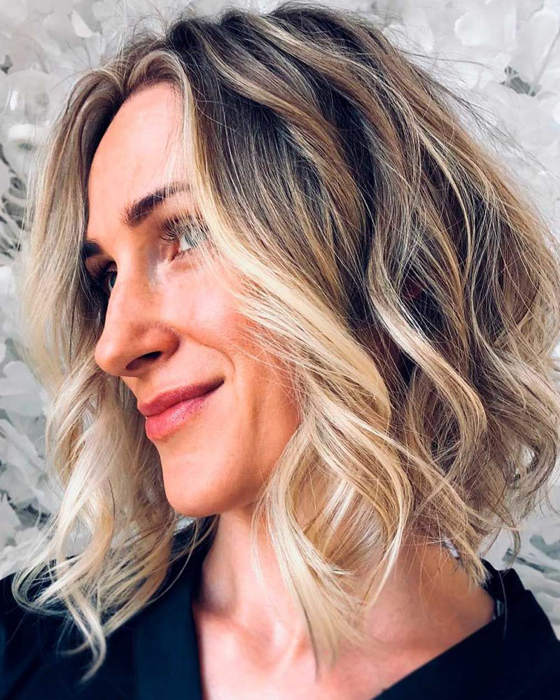 medium length hairstyles women tousled layered blonde balayage lob Luxe Digital