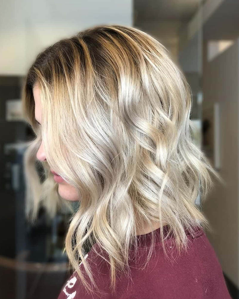 medium length hairstyles women tousled layered blonde balayage lob Luxe Digital