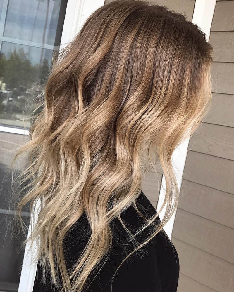 medium length hairstyles women wavy layered hairstyle for dimensional balayage Luxe Digital