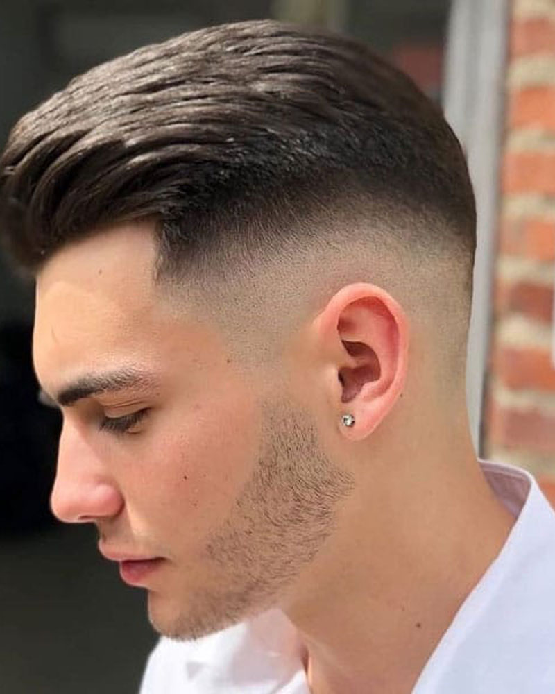 men fade haircuts slicked back hair with medium fade Luxe Digital