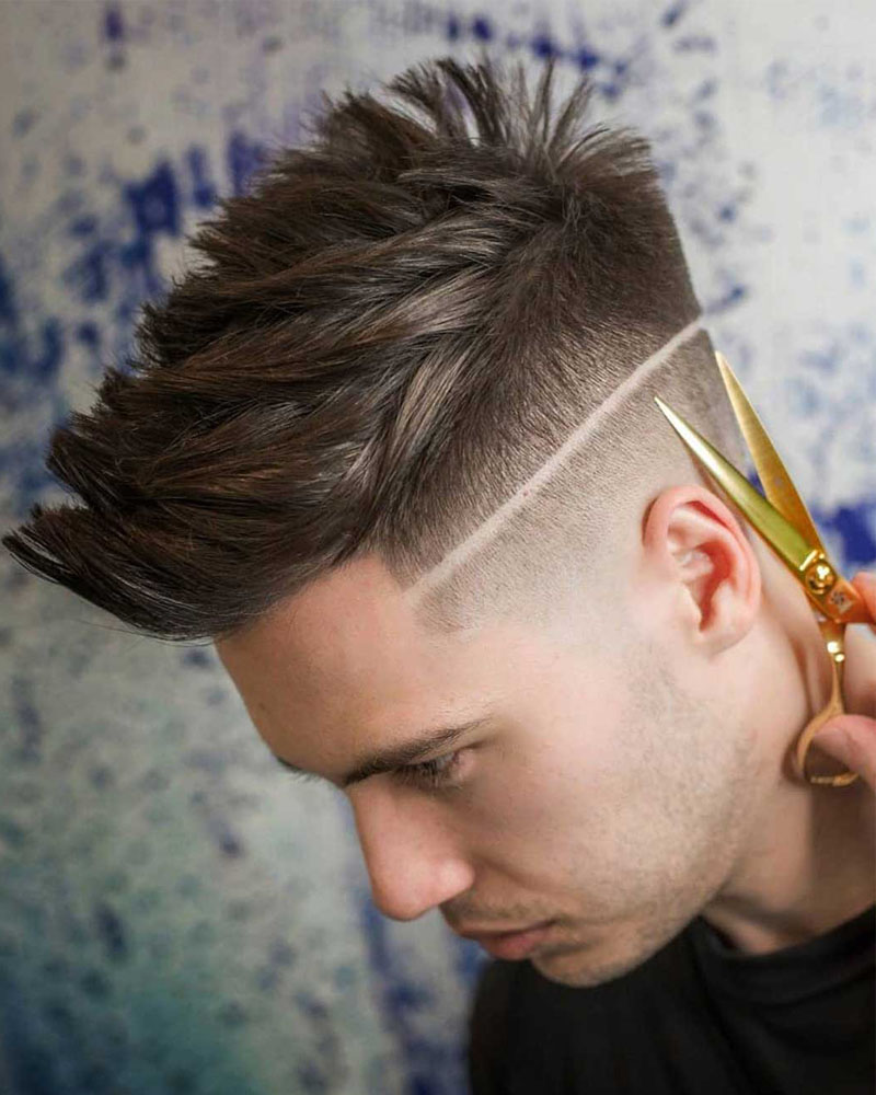 men fade haircuts undercut fade with hard part and textured spikes Luxe Digital
